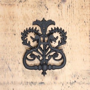 Fancy decorative cast iron door knocker