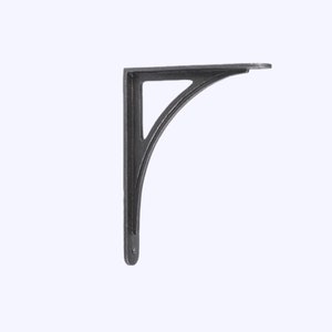 May include: A dark gray, cast iron shelf bracket with a curved support and a triangular cutout. The bracket has a flat top for supporting a shelf and a hole for mounting. The overall design is simple and functional.