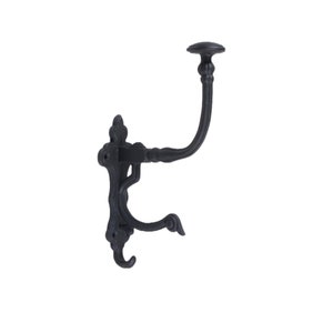 May include: A black, decorative wall hook with an elaborate design. It has a curved arm and a hook at the bottom. The hook is made of metal and is suitable for hanging coats, hats, or other items. The design is vintage-inspired.