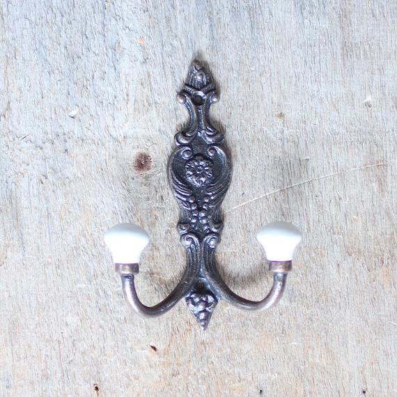Cast iron ceramic double hooktip hook.