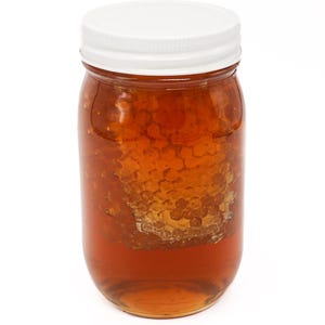 Pure wildflower Honey 22oz pint jar with comb