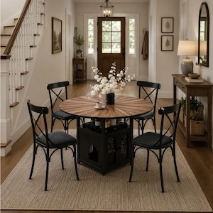 May include: A round wooden dining table with a sunburst pattern top and a black base featuring storage cabinets, surrounded by four black chairs with X-shaped backrests and dark gray upholstered seats, all placed on a woven area rug.