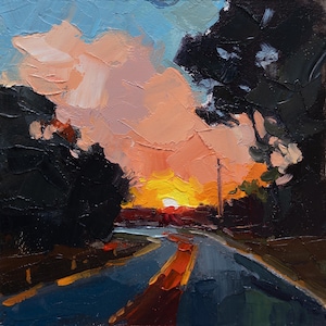 May include: An oil painting on canvas depicting a sunset over a road. The sky features thick, textured brushstrokes in shades of peach, pink, and light blue. Dark, silhouetted trees frame the sides, while a bright yellow sun glows on the horizon.