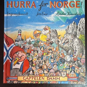 May include: A children's book titled "HURRA for NORGE!" with illustrations of a crowd of people, a troll, and a man in a boat. The cover features the Norwegian flag and the text "CAPPELEN DAMM". The background shows a night sky with the Northern Lights.