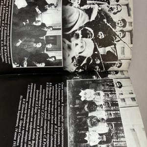 May include: Black and white photographs of historical figures, likely from the early 20th century, are displayed on a book page. The images include group portraits of men in formal attire, possibly government officials or military personnel. Text in Russian accompanies the images.