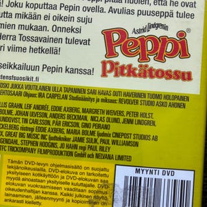 May include: DVD case for "Peppi Pitk&auml;tossu" (Pippi Longstocking) featuring the title in red and yellow. The case has Finnish text and a barcode. The DVD is rated 3.