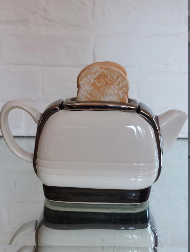 アンティーク雑貨 Swineside Teapottery The Tea Toaster il_fullxfull.6155694426_obdq.jpg