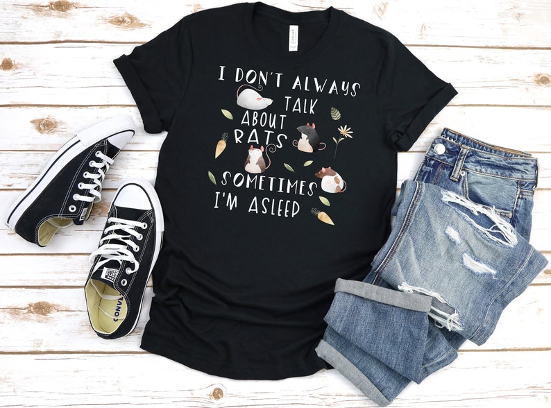 May include: Black t-shirt with a white graphic that says "I don't always talk about rats, sometimes I'm asleep". The graphic also features cartoon rats and carrots.