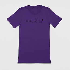 May include: Purple short-sleeved t-shirt with the text "100% authentic" and a small heart.