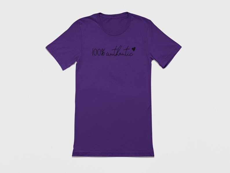 May include: Purple short-sleeved t-shirt with the text "100% authentic" and a small heart.