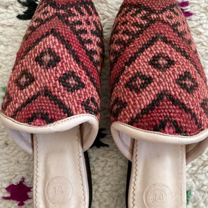 Handmade Moroccan vintage carpet rug slippers with soft lined organic leather and hard leather organic sole with the hand of Fatima