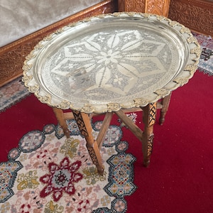 Handmade hand engraved vintage Moroccan brass table tray with handcrafted folding wooden legs