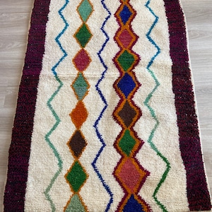 Handmade Moroccan Berber multicoloured tribal abstract geometric ethnic wool rug from Azilal