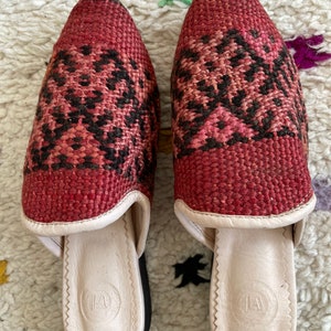 Handmade Moroccan vintage carpet rug slippers with soft lined organic leather and hard leather organic sole with the hand of Fatima