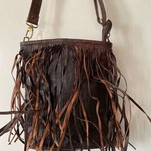 Handmade genuine organic soft leather with Tusels and pocket inside