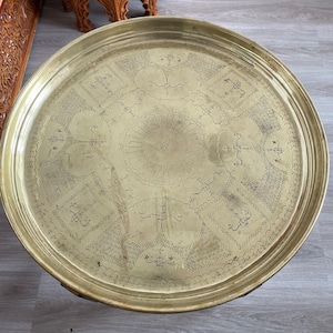 Handmade handcrafted vintage Moroccan bronze table with folding wooden legs