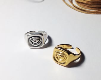 Anillo ajustable con ojo turco, tono dorado o plateado, joyería de protección unisex.