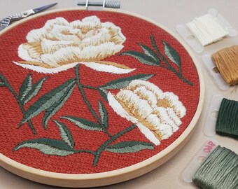 Hand embroidered hoop art. Flower and leaves