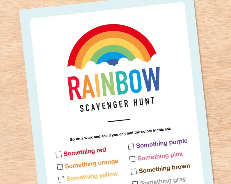 May include: A printable rainbow scavenger hunt activity sheet with a colorful rainbow and clouds graphic. The sheet includes a list of colors to find: red, orange, yellow, green, blue, purple, pink, brown, and gray.