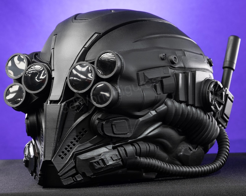 futuristic black helmet with layered visor elements