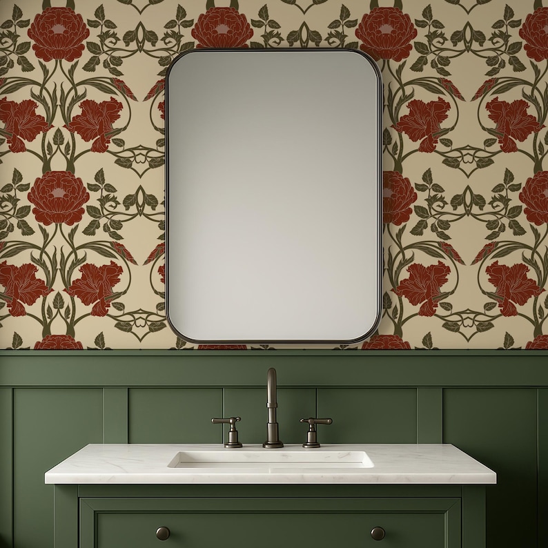 May include: A bathroom vanity with a white marble countertop and a dark green cabinet. A rectangular mirror with rounded corners hangs above the sink. The wallpaper features a floral pattern with red flowers and green leaves on a cream background.