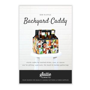 May include: A sewing pattern for a Backyard Caddy, a sturdy tote bag for carrying drinks, cans, or sauces. The pattern is from Sallie Tomato, a source for quality sewing patterns and purse supplies.