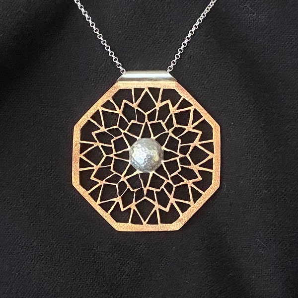 Bronze hand saw pierced mandala pendant