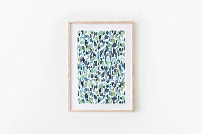Puede incluir: Una impresi&oacute;n abstracta enmarcada con un patr&oacute;n de puntos de acuarela azules, verdes y blancos.