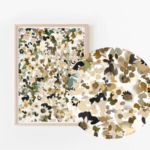 May include: A framed print with a white background and a pattern of abstract flowers in shades of brown, beige, green, and black.