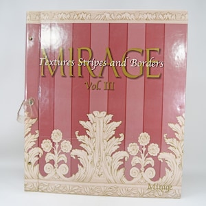 Puede incluir: Un archivador a rayas rojas y rosas titulado "Mirage Textures Stripes and Borders Vol. III". El archivador presenta un diseño floral y de desplazamiento decorativo en color crema a lo largo de los bordes superior e inferior.