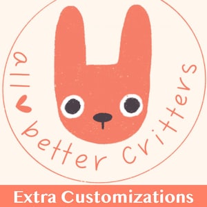 May include: A circular logo features a stylized orange bunny face with black eyes and a dark gray nose. The words "all better critters" are in a circular pattern around the bunny. Below, the text reads "Extra Customizations for AllBetterCritters."