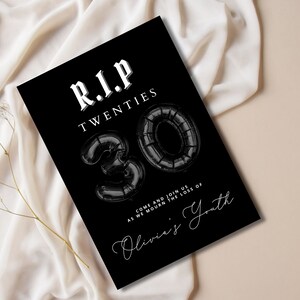 May include: Black and white birthday party invitation with the text "R.I.P. Twenties" and a black balloon number 30. The text "Come and join us as we mourn the loss of Olivia's Youth" is also included.
