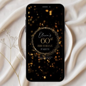 May include: A black mobile phone screen displaying a gold glitter birthday invitation for Olivia's 60th birthday party. The invitation has a gold circle with the text "Olivia's 60th Birthday Party" and a black background with gold glitter.