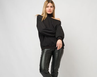 Schwarze schulterfreie Bluse/Langarm-Cut-Out-Shirt/Cold-Shoulder-Top