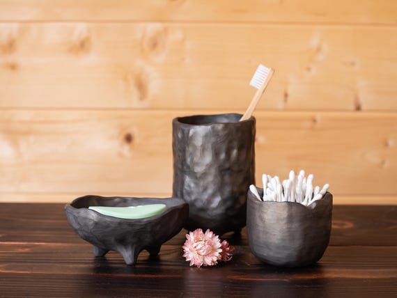 Black ceramic bathroom accessories set of 3 items. Handmade black pottery storage for soap, toothbrushes and other. Nordic, minimalism.