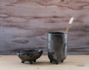 Black ceramic bathroom accessories set of 2 items. Handmade soap dish and dish for toothbrushes of black pottery. Nordic, minimalism.