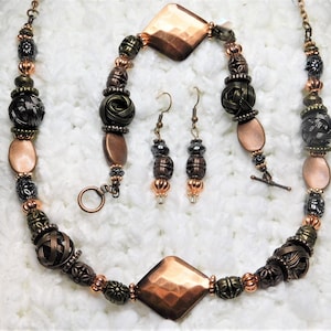 Gifts, beaded jewelry, necklaces, bracelets, earrings, copper and other metal tones.  Item #1027