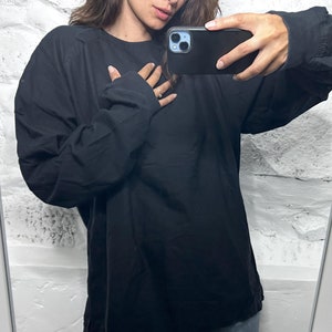Black sweater with thumb holes best sale
