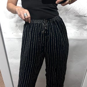 Vintage boho palazzo-broek jaren 90 – bloemen taillebroek met trekkoord - M