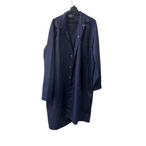 May include: A navy blue long coat with a button-down front and long sleeves. The coat is hanging on a black hanger against a white background. The coat has a collar and appears to be made of a smooth fabric.