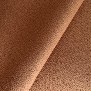 Tan Faux Leather Upholstery Fabric For Sofa Cushion Craft Car Bag and other Projects.