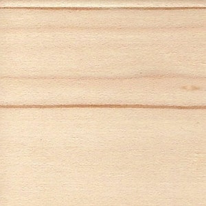 May include: A close-up of a light wood surface with a natural grain pattern. The wood has a smooth, even texture.