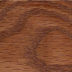 May include: Close-up of a wood grain pattern with a reddish-brown color.