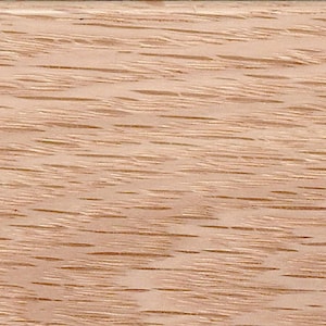 May include: Close-up of a light brown wood grain surface. The wood has a natural, unfinished look with a subtle reddish hue.