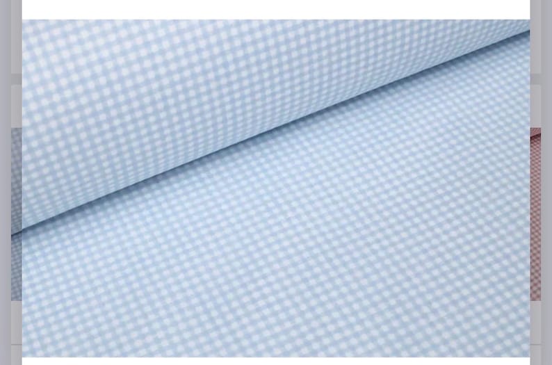 May include: A roll of fabric featuring a light blue and white gingham check pattern. The textile displays a consistent, small-scale checkered design across the entire surface, with the fabric folded to show depth and texture of the material.