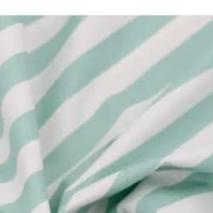 May include: A fabric textile featuring a repeating pattern of diagonal stripes in alternating light mint green and white colors. The material is gathered and folded, creating soft, flowing drapes and shadows across the surface of the cloth.