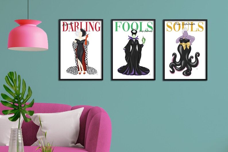 May include: Three framed prints featuring Disney villains. The first print features Cruella de Vil with the text "Darling". The second print features Maleficent with the text "Fools". The third print features Ursula with the text "Souls".