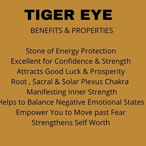 May include: A tan informational card with black text that reads: TIGER EYE, BENEFITS & PROPERTIES, Stone of Energy Protection, Excellent for Confidence & Strength, Attracts Good Luck & Prosperity, Root, Sacral & Solar Plexus Chakra, Manifesting Inner Strength.