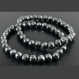 Bracelet en perles d'hématite à facettes, protection de l'énergie, accent argenté