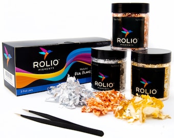 May include: A set of three jars of metallic foil flakes in silver, copper, and gold. The jars are labeled "ROLIO PIGMENTS" and are non-toxic. The set includes a pair of tweezers for applying the foil flakes.